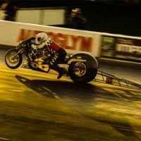 Buy canvas prints of Drag bike at sunset by Oxon Images
