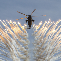 Buy canvas prints of Commando Sea King Firing Flares by Oxon Images