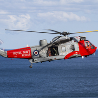 Buy canvas prints of Royal Navy Sea King rescue helicopter by Oxon Images