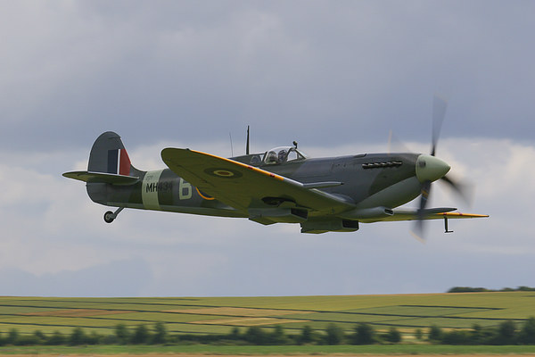  Low Spitfire at Duxford Picture Board by Oxon Images