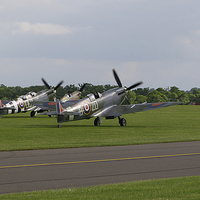 Buy canvas prints of  Three Spitfires at Duxford by Oxon Images