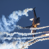 Buy canvas prints of  Belgian F16 firing flares by Oxon Images