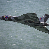 Buy canvas prints of  Vulcan Bomber passing Beachy Head by Oxon Images