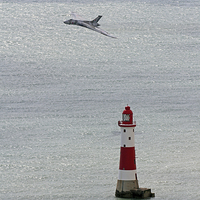 Buy canvas prints of  Vulcan XH558 and the Lighthouse by Oxon Images