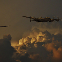 Buy canvas prints of Lancasters above the storm  by Oxon Images