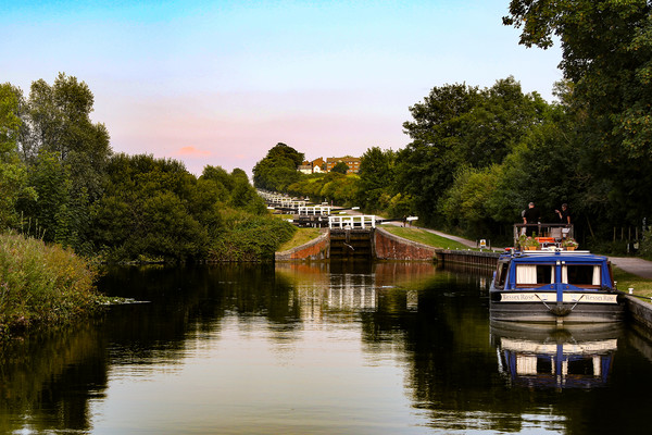 Moored at Caen Hill Locks Picture Board by Oxon Images