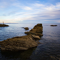Buy canvas prints of Hannafore Beach and rocks by Oxon Images