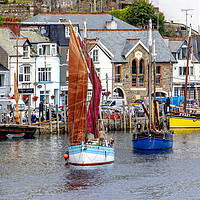 Buy canvas prints of Looe Luggers heading down Looe River by Oxon Images