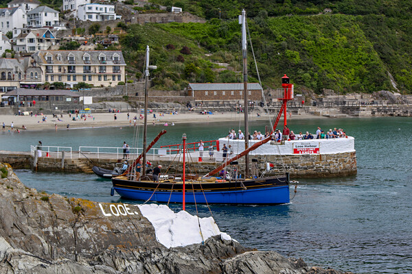 Looe Lugger Passing Looe Banjo Pier Picture Board by Oxon Images