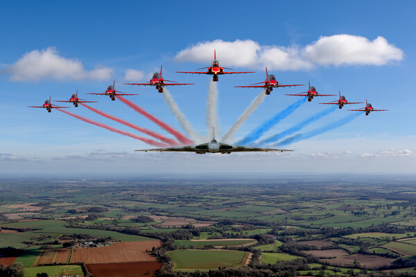 Reds and Vulcan Running In Picture Board by Oxon Images