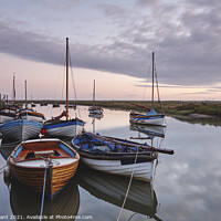 Buy canvas prints of Boats moored in Blakeney Harbour at dawn. Norfolk, UK. by Liam Grant