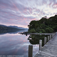 Buy canvas prints of Jetty and reflections on the surface of Coniston Water at dawn. by Liam Grant