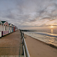 Buy canvas prints of UK, Suffolk, Southwold, colourful beach huts and promenade at sunrise by Liam Grant