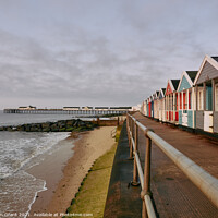 Buy canvas prints of UK, Suffolk, Southwold pier and colourful beach huts at sunrise by Liam Grant