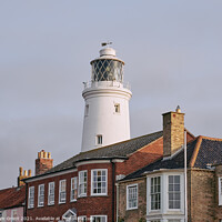 Buy canvas prints of UK, Suffolk, Light from the sunrise on southwold lighthouse by Liam Grant