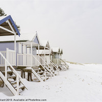 Buy canvas prints of Beach huts covered in snow. Wells-next-the-sea, No by Liam Grant
