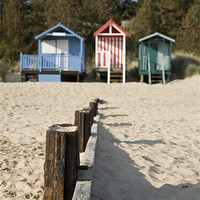 Buy canvas prints of Beach huts. Wells-next-the-sea. by Liam Grant