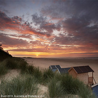 Buy canvas prints of Beach huts and sunset. by Liam Grant