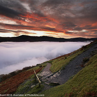 Buy canvas prints of Derwent Water below cloud at sunrise. by Liam Grant