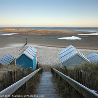 Buy canvas prints of Frost covered beach huts, Wells-next-the-sea by Liam Grant