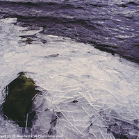 Buy canvas prints of Broken ice on the shore of Grasmere. by Liam Grant