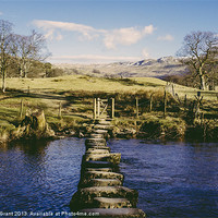 Buy canvas prints of Stepping stones over the River Rothay near Amblesi by Liam Grant