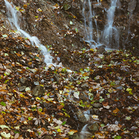Buy canvas prints of Waterfall and autumnal leaves near Brothers Water. by Liam Grant