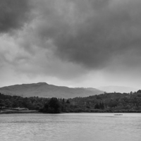 Buy canvas prints of Rainclouds and rain over Rydal Water at dusk. by Liam Grant