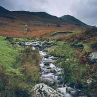 Buy canvas prints of Cinnerdale Beck with Whiteless Pike beyond. by Liam Grant
