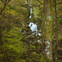 Buy canvas prints of Deciduous woodland and Lodore Falls Waterfall. by Liam Grant