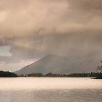 Buy canvas prints of Evening rainclouds and distant rain over Skiddaw a by Liam Grant