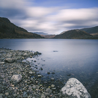 Buy canvas prints of Clouds sweeping over Thirlmere. by Liam Grant