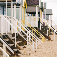 Buy canvas prints of Beach huts at Wells-next-the-sea. by Liam Grant