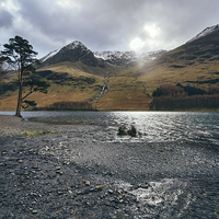 Buy canvas prints of Snow capped mountains on Buttermere. by Liam Grant