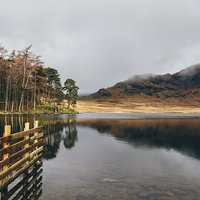 Buy canvas prints of Low cloud and reflections on Blea Tarn. by Liam Grant