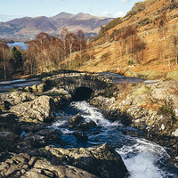 Buy canvas prints of Ashness Bridge with Skiddaw beyond. by Liam Grant