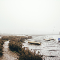 Buy canvas prints of Boats moored at Blakeney in fog. by Liam Grant