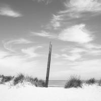 Buy canvas prints of Blue sky beach and sand dunes. Wells-next-the-sea. by Liam Grant