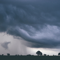 Buy canvas prints of Evening thunder storm and clouds over rural scene. by Liam Grant