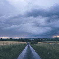 Buy canvas prints of Evening thunder storm and clouds over rural scene. by Liam Grant