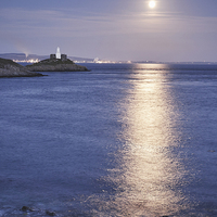Buy canvas prints of Full moon and lighthouse at Mumbles Head. Wales, U by Liam Grant