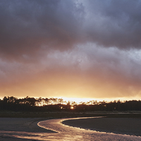 Buy canvas prints of Storm clouds at sunset. Holkham, Norfolk, UK. by Liam Grant