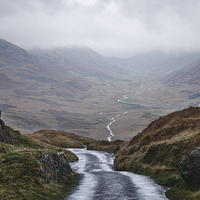 Buy canvas prints of Rain clouds and road through the Wrynose Pass. Cum by Liam Grant
