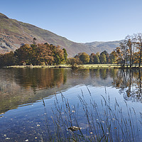 Buy canvas prints of Reflections and autumnal colour. Ullswater, Cumbri by Liam Grant