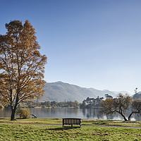 Buy canvas prints of Bench and autumnal colour. Ullswater, Cumbria, UK. by Liam Grant