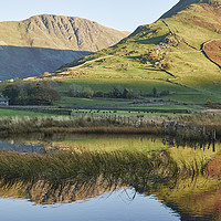 Buy canvas prints of Golden reflections. Brothers Water, Cumbria, UK. by Liam Grant