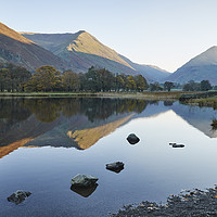 Buy canvas prints of Golden reflections. Brothers Water, Cumbria, UK. by Liam Grant