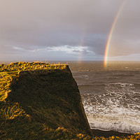 Buy canvas prints of Rainbow and stormy sky at sunset. Sheringham, Norf by Liam Grant