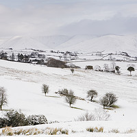 Buy canvas prints of Snow covered mountains and farmland. Cumbria, UK. by Liam Grant