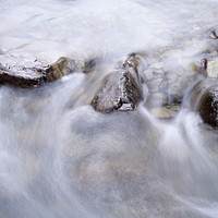 Buy canvas prints of River water flowing between rocks. Cumbria, UK. by Liam Grant